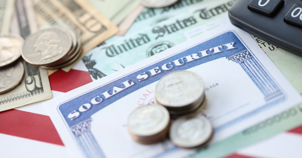 social security number card and calculator on American flag