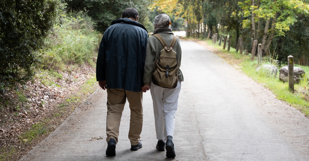 Senior couple walking hand in hand