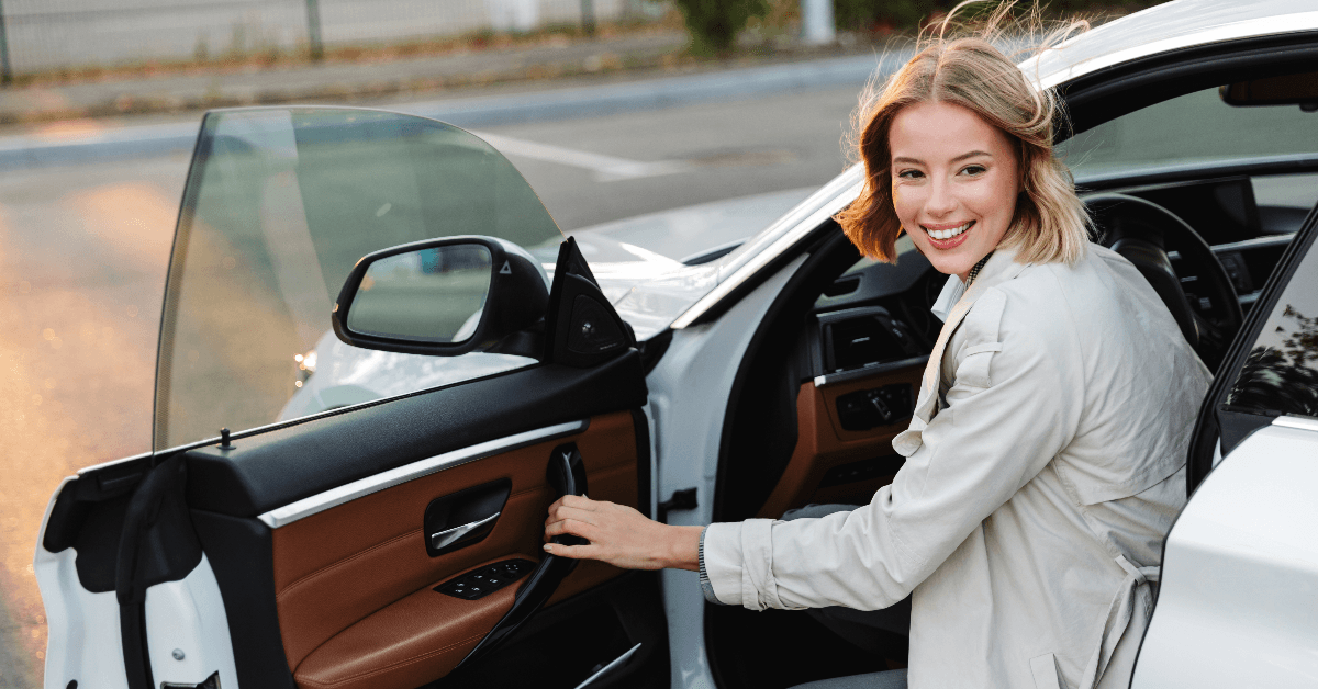 Woman in luxury car