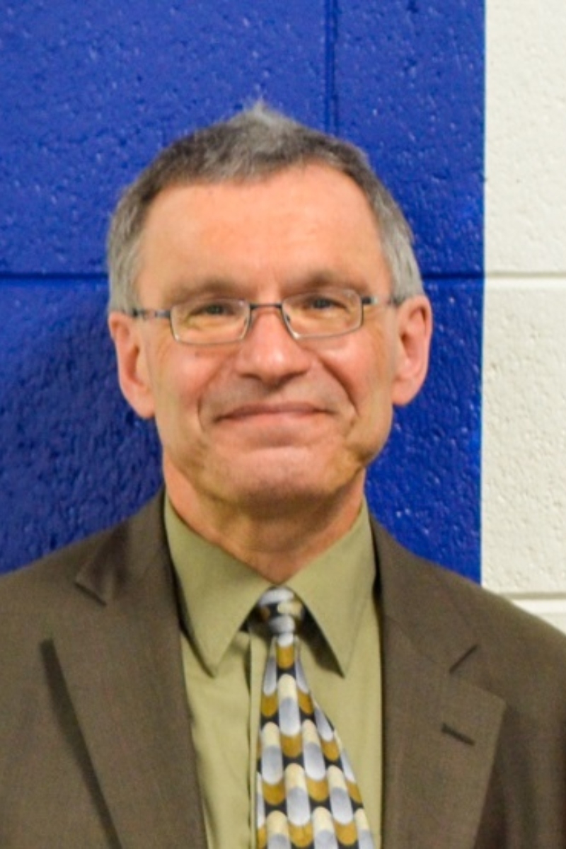 Professional headshot of Professor Dima Leschchinskii of Menlo College