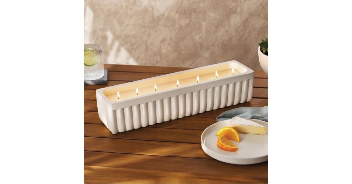 citronella candle in cement trough