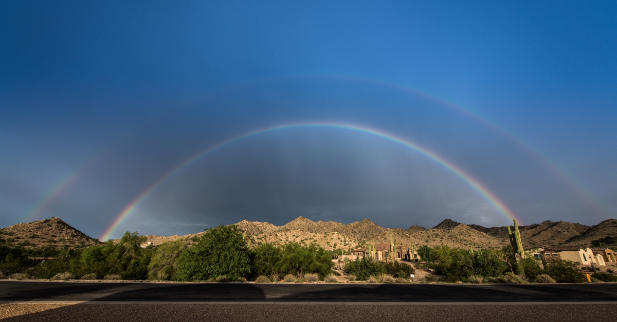 Double rainbow over desert
