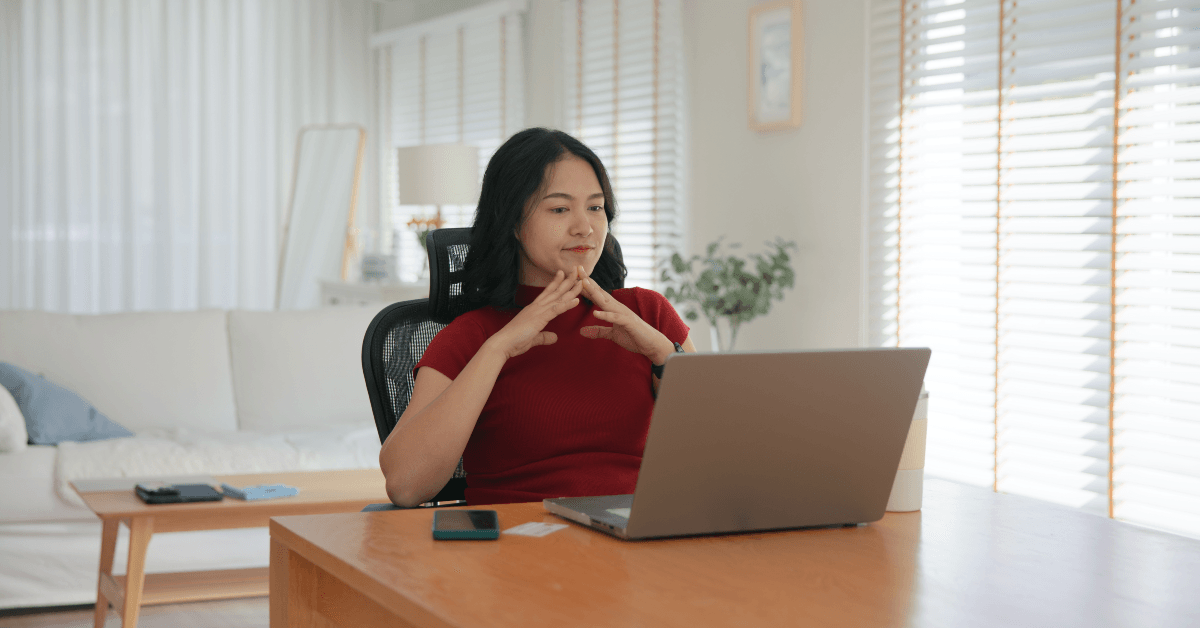 Young woman on computer reading reviews before purchasing