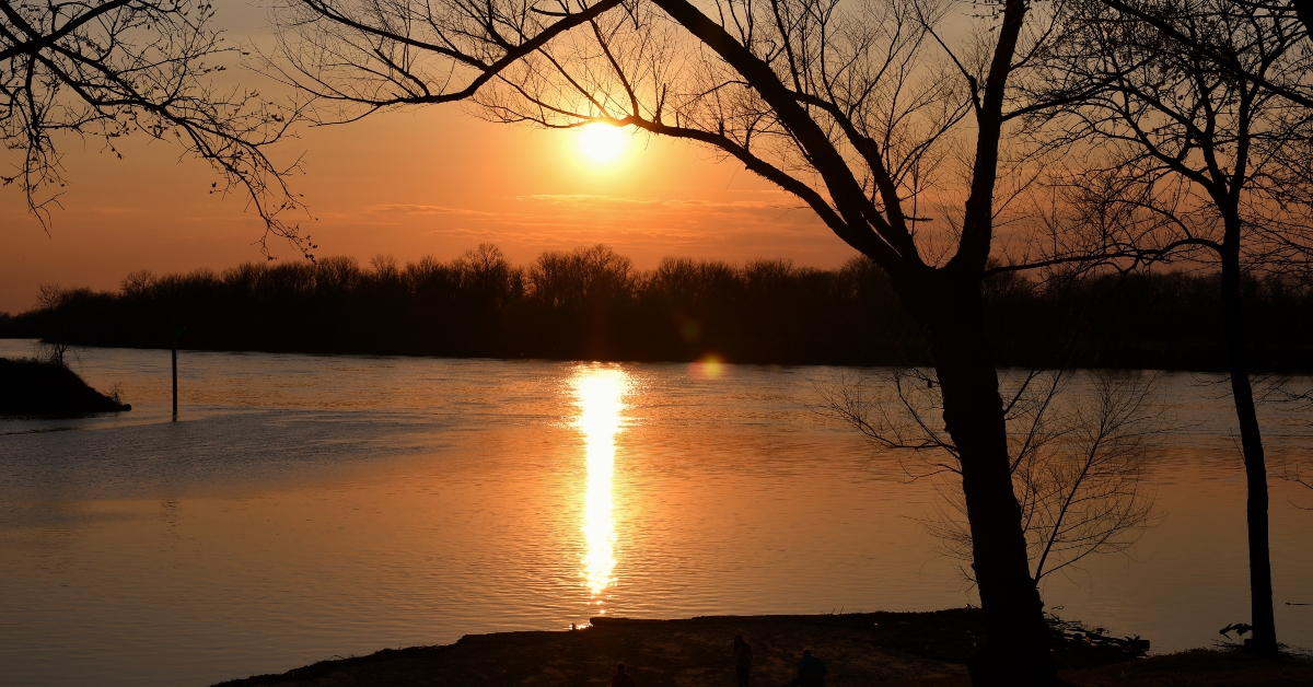 sunset with silhouette trees from fort smith