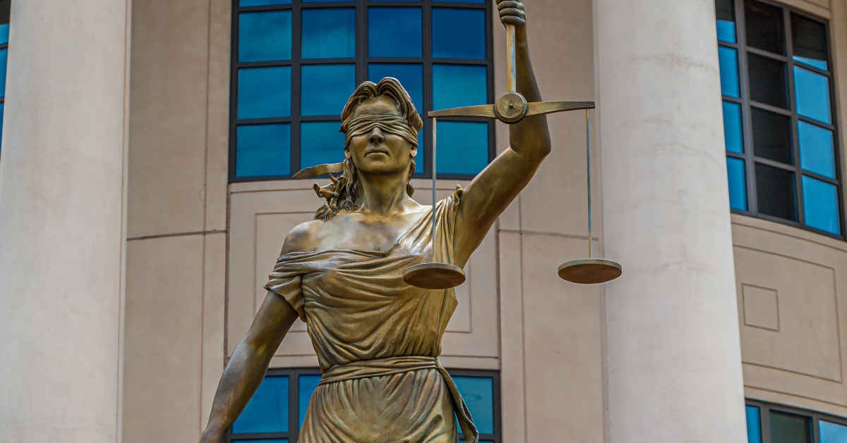 lady justice at county courthouse
