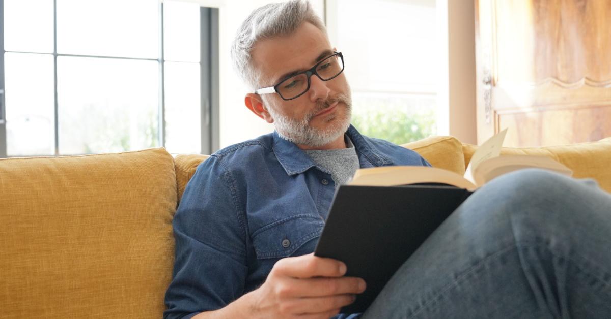 reading a book on couch