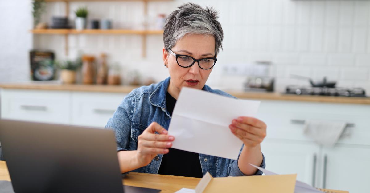 Woman holding letter