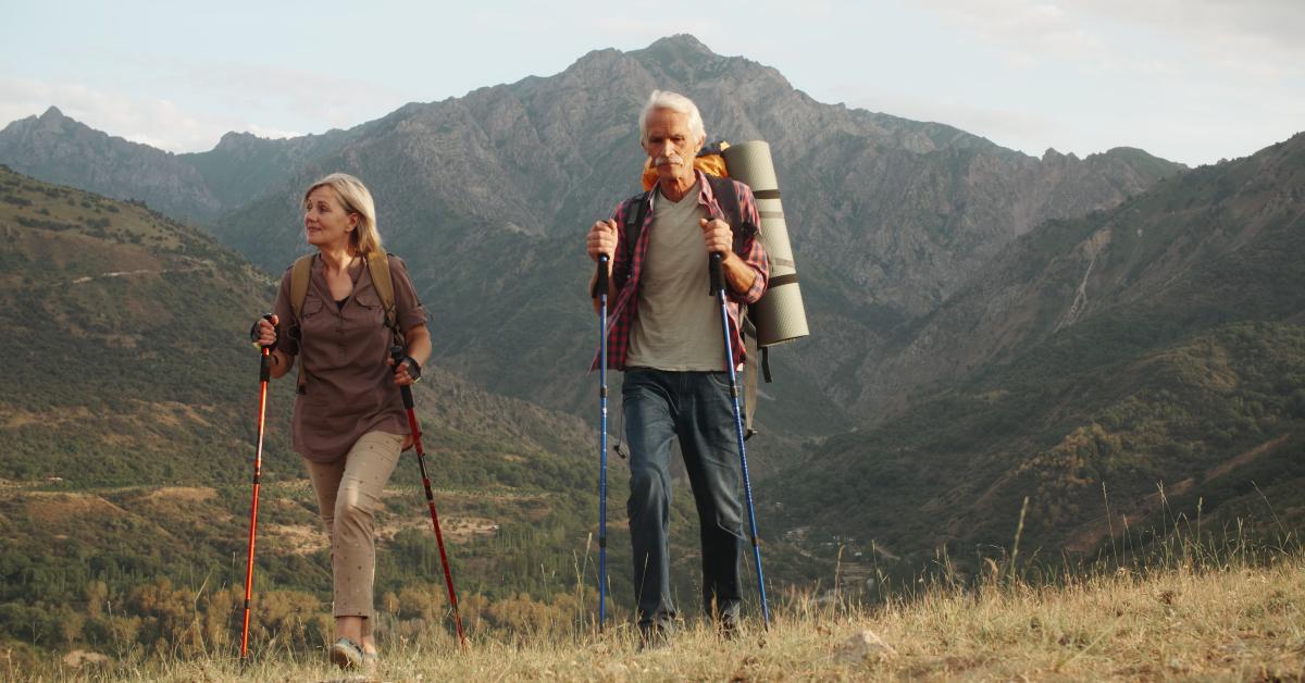 couple trekking in mountains