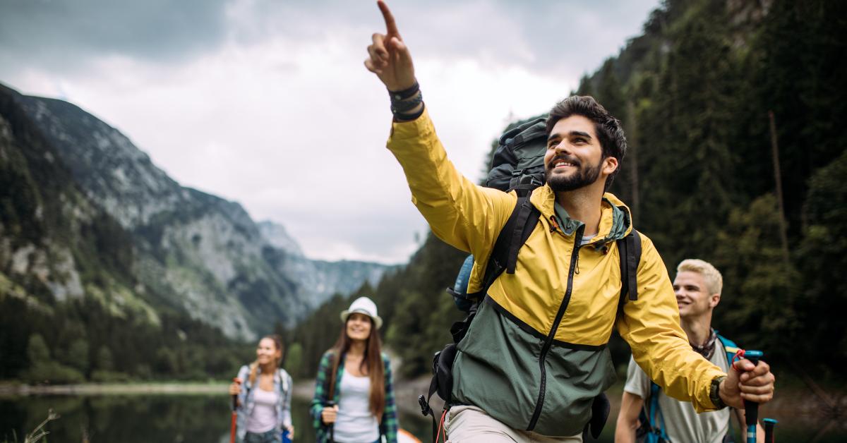 friends with backpacks hiking