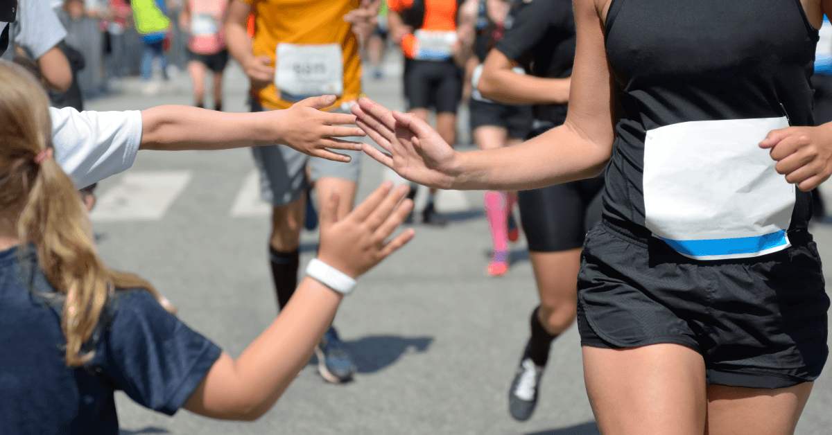 Runners getting a high five