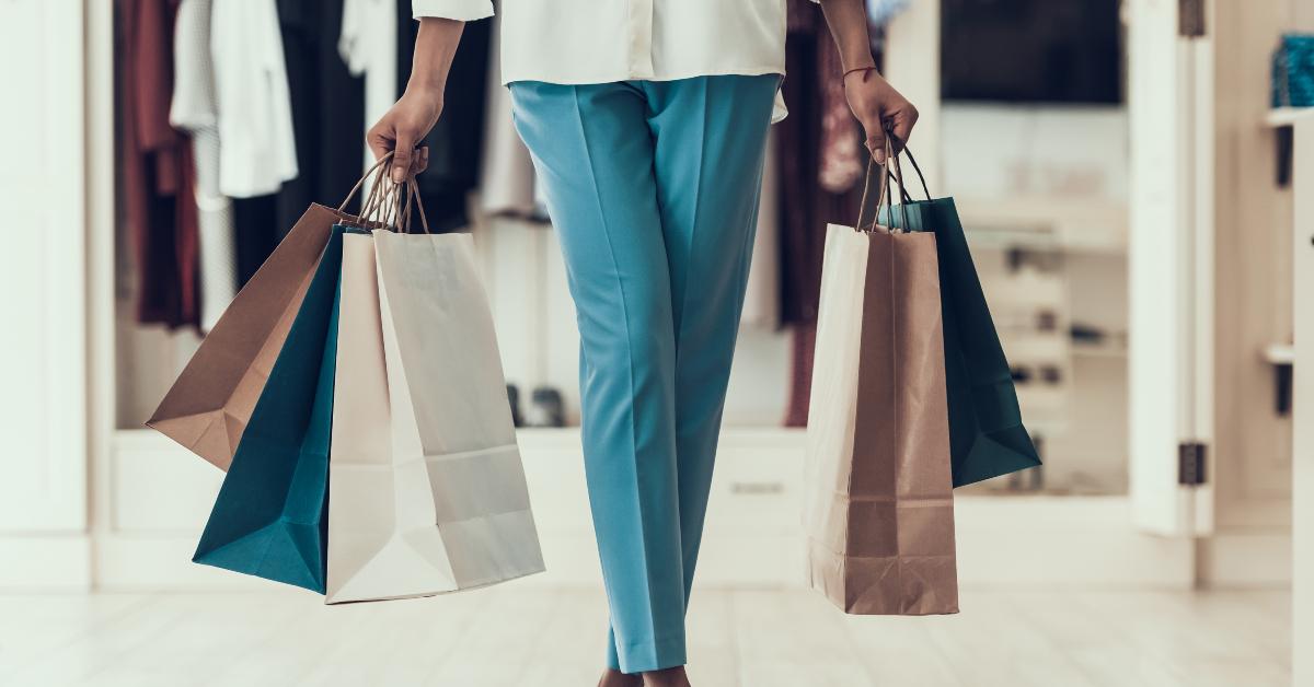 holding shopping bags 