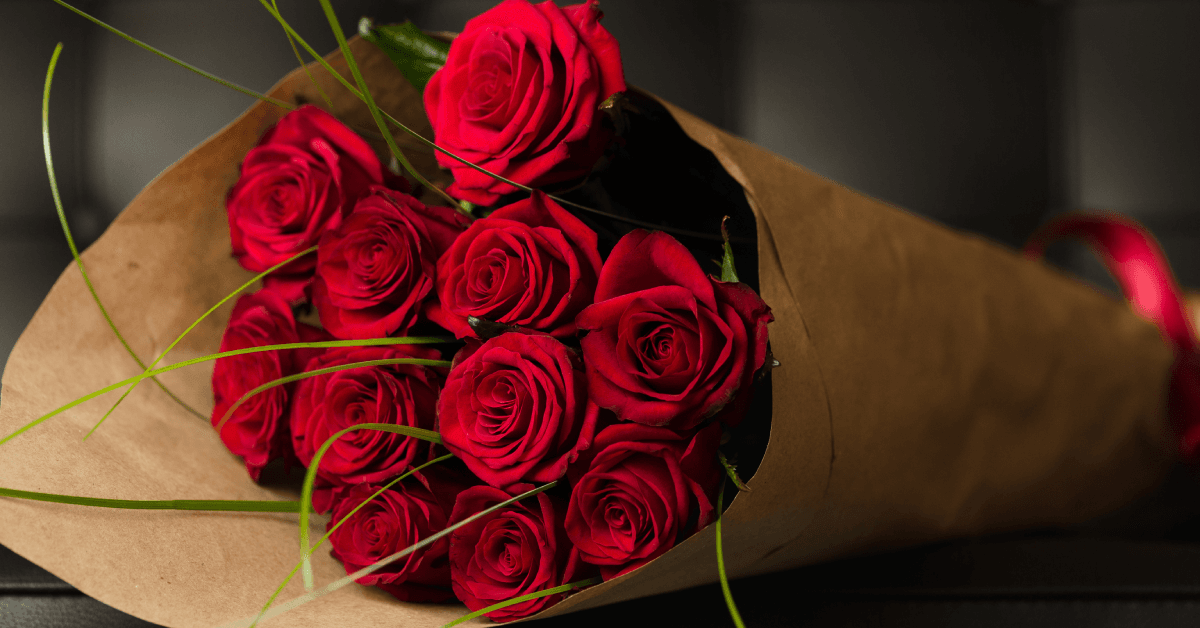 Bouquet of red roses on black background