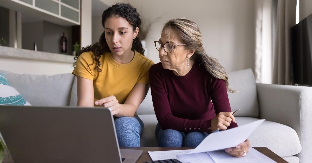 daughter helping senior mother