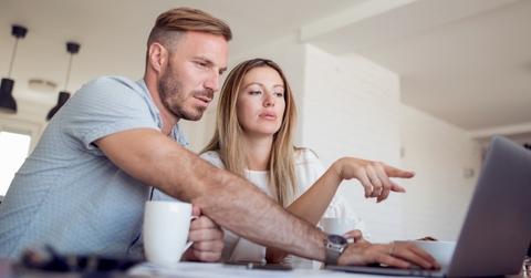 Couple looking at computer