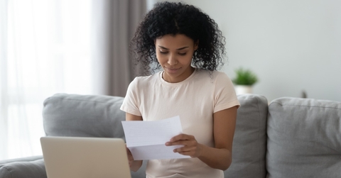 Woman looking at paperwork