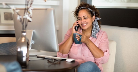 Happy woman talking on the phone
