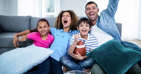 family watching super bowl on tv