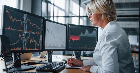 Hedge fund investor looking at computer
