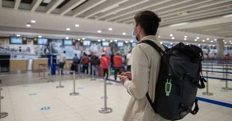 Man at airport in customer service area