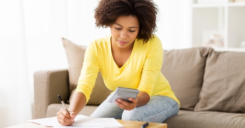 Woman with calculator