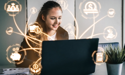 woman using a laptop for a bank transfer