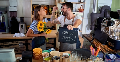happy local coffee shop owners