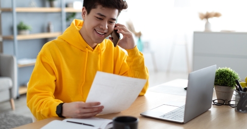 A young virtual assistant on the phone with their client