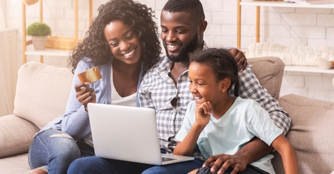 Family looking at a computer