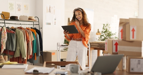 Business woman reviewing her expenses