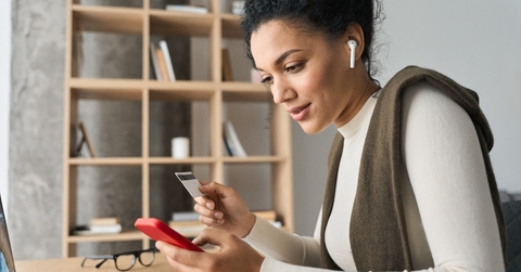Woman working on phone