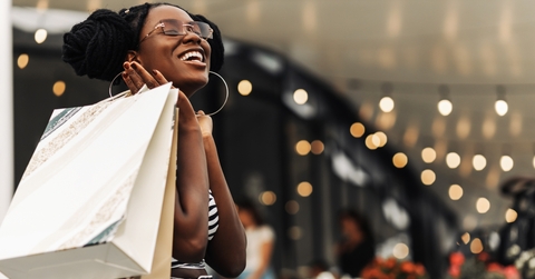 in the mall with shopping bags