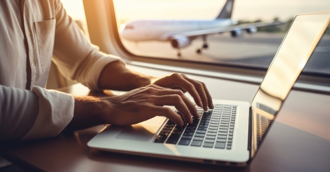 using a laptop while on an airplane