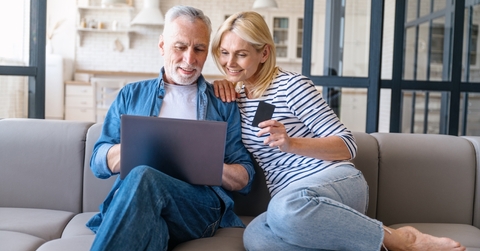 A couple researching best balance transfer cards