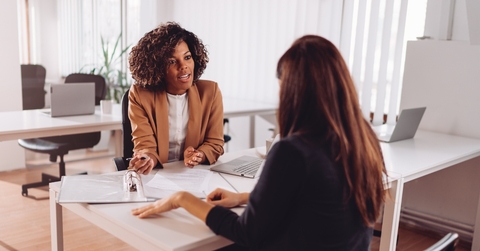 woman consulting finance manager at bank