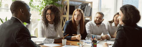 Group of professionals around a table