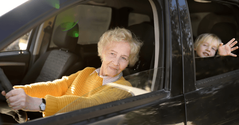 Grandma driving kid in car