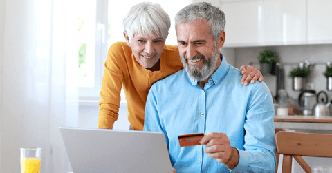 Couple using credit card online