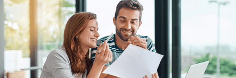 couple looking at paperwork together