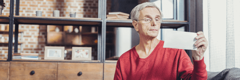 Retiree checking social security check