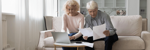 Older couple looking at paperwork