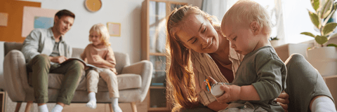 Young family playing at home