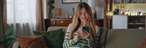 Young woman checking online banking on phone