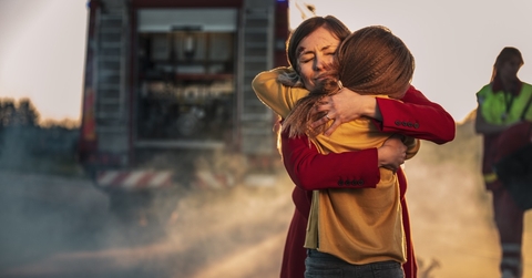 Mother and daughter hugging 