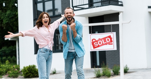 Happy couple that just bought a house