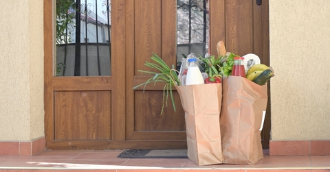 Bags of groceries outside front door