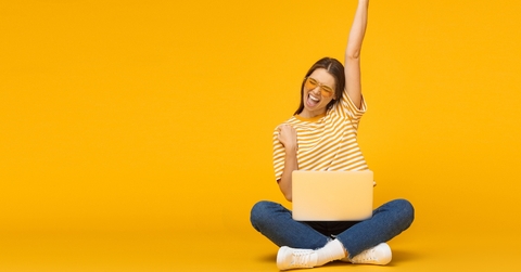 Happy woman with computer