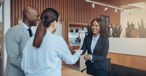 Couple checking in at hotel