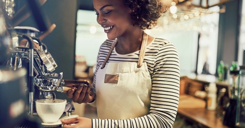 Barista making coffee