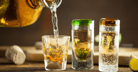 Tequila shots being poured 