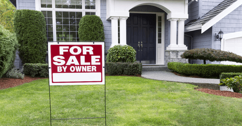 For sale sign outside house